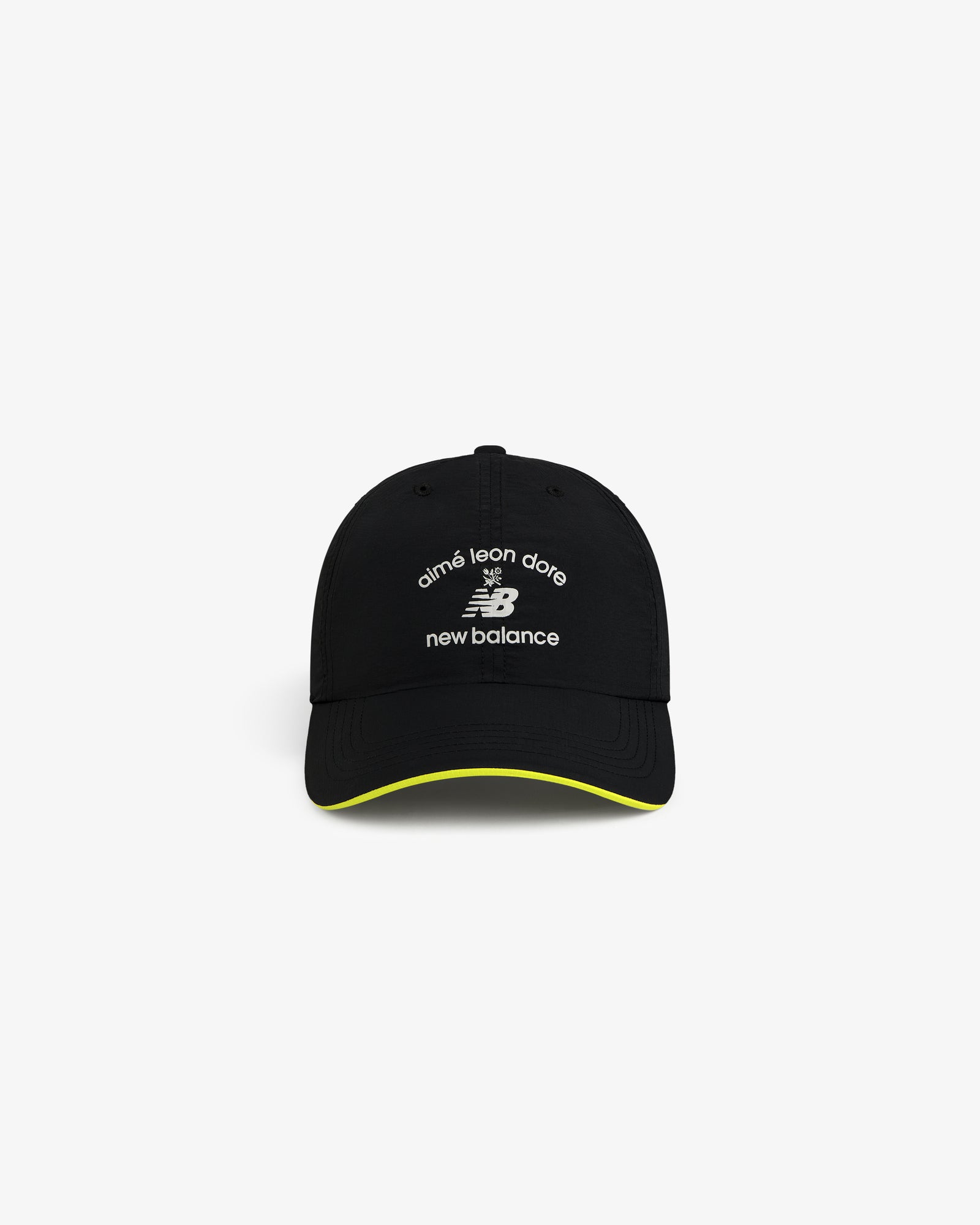ALD / New Balance Running Hat with white logos and yellow trim on the brim.