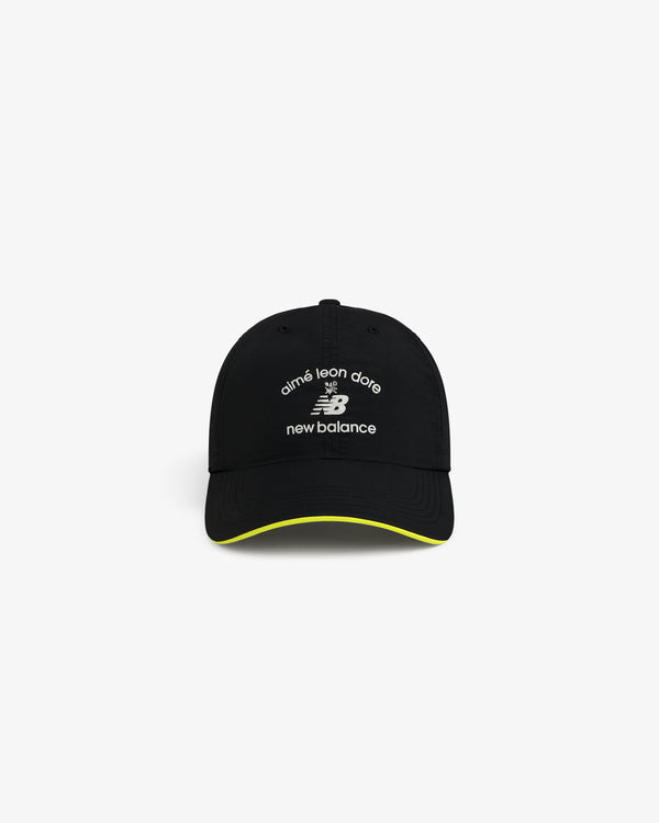 ALD / New Balance Running Hat with white logos and yellow trim on the brim.