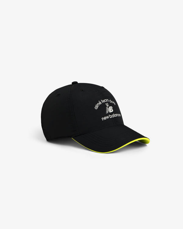 ALD / New Balance Running Hat: Black cap with white logo and yellow accent under the brim.
