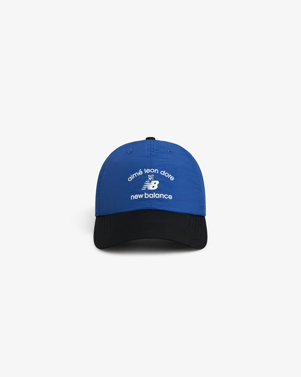 Blue and black ALD / New Balance Running Hat with white embroidered logos on the front.