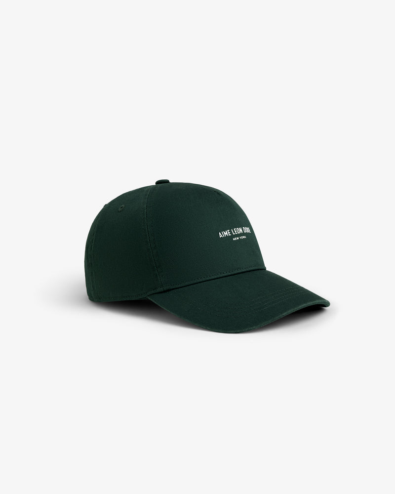 Micro Logo Hat in dark green with small white front text, shown on a plain white background.