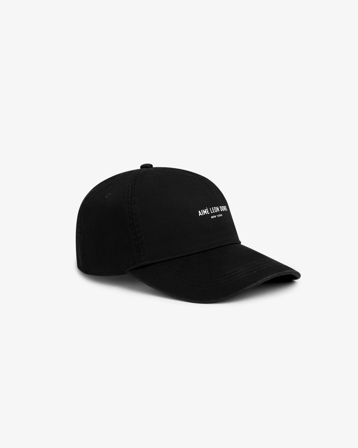 Micro Logo Hat: black baseball cap with small white logo embroidery on front, shown on plain white background.