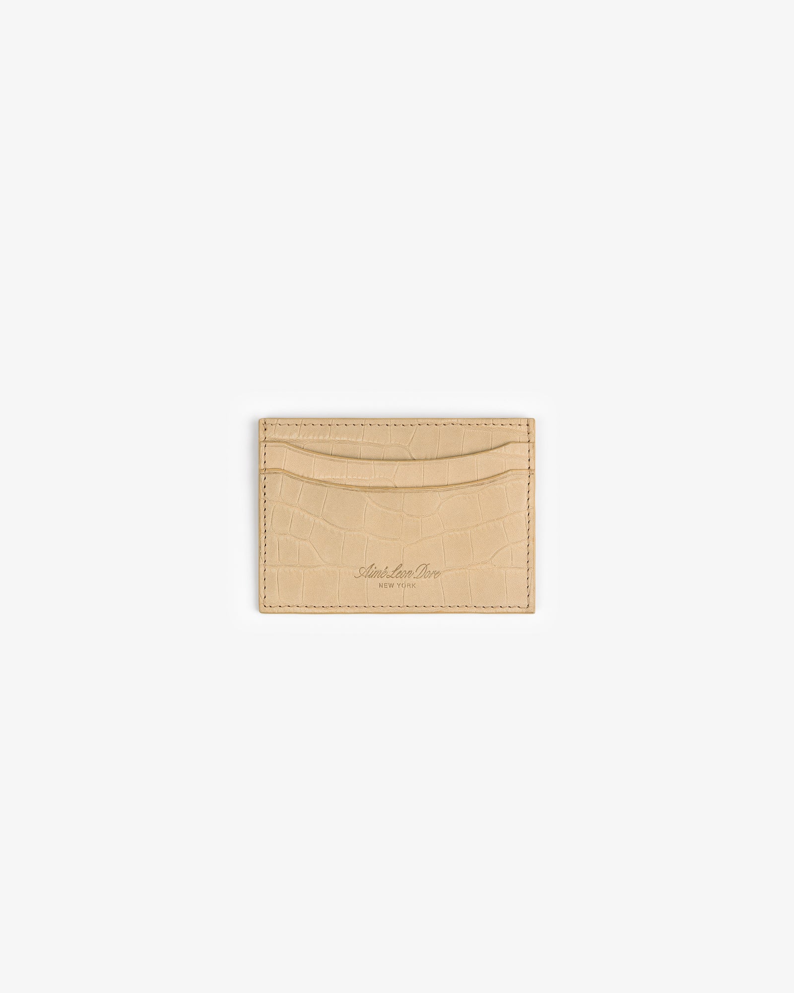 A beige Croc-Embossed Nubuck Cardholder with two slots, shown on a plain white background.