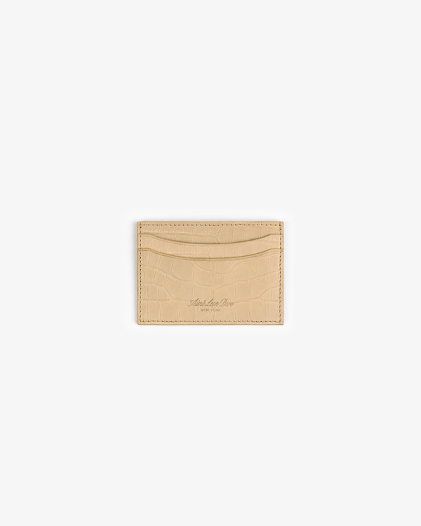 A beige Croc-Embossed Nubuck Cardholder with two slots, shown on a plain white background.
