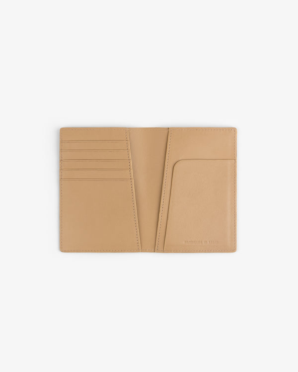 Croc-Embossed Nubuck Passport Holder open flat, card slots left, large pocket right on white background.