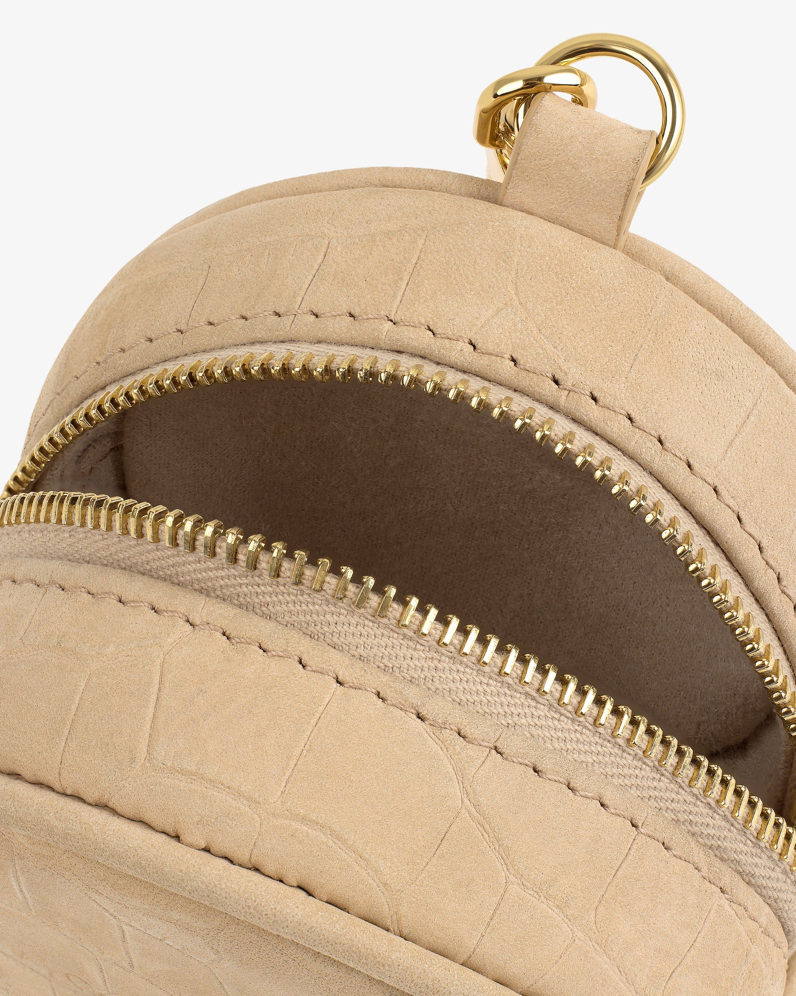 Close-up of the Croc-Embossed Nubuck Keychain Pouch, beige with gold zippers and visible inner lining.