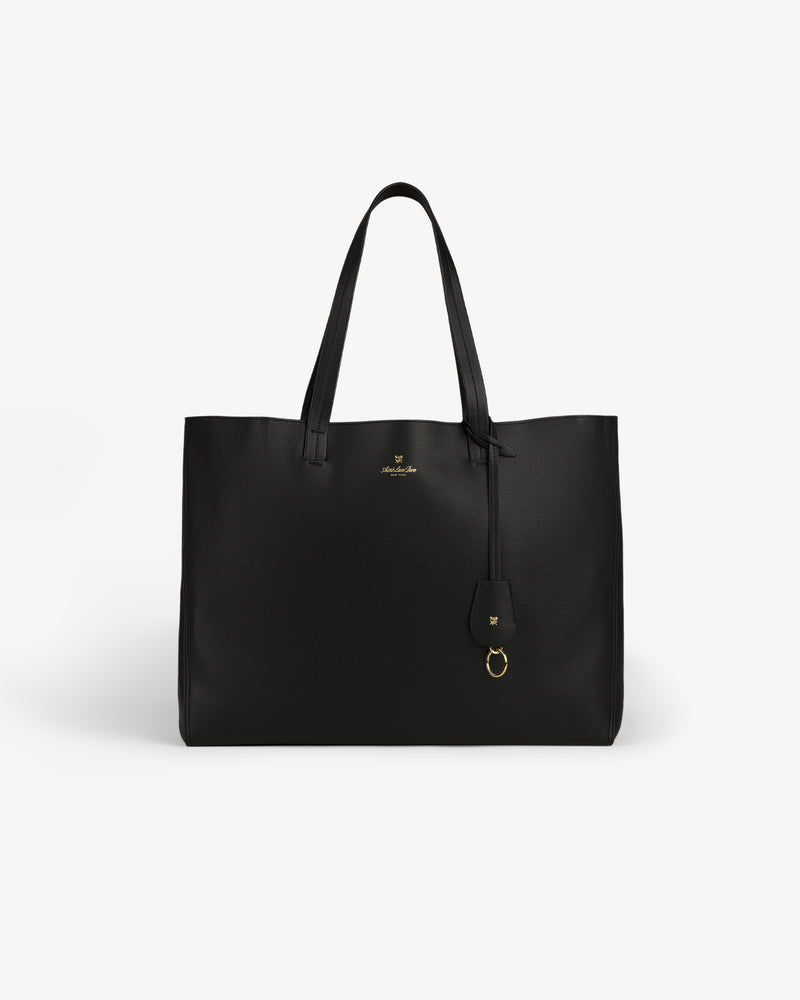 Full Grain Leather Tote Bag in black leather with two handles and a small gold logo, shown on a white background.