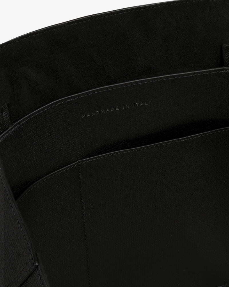Close-up of the Full Grain Leather Tote Bag’s interior showing HANDMADE IN ITALY stamped on the inner pocket.