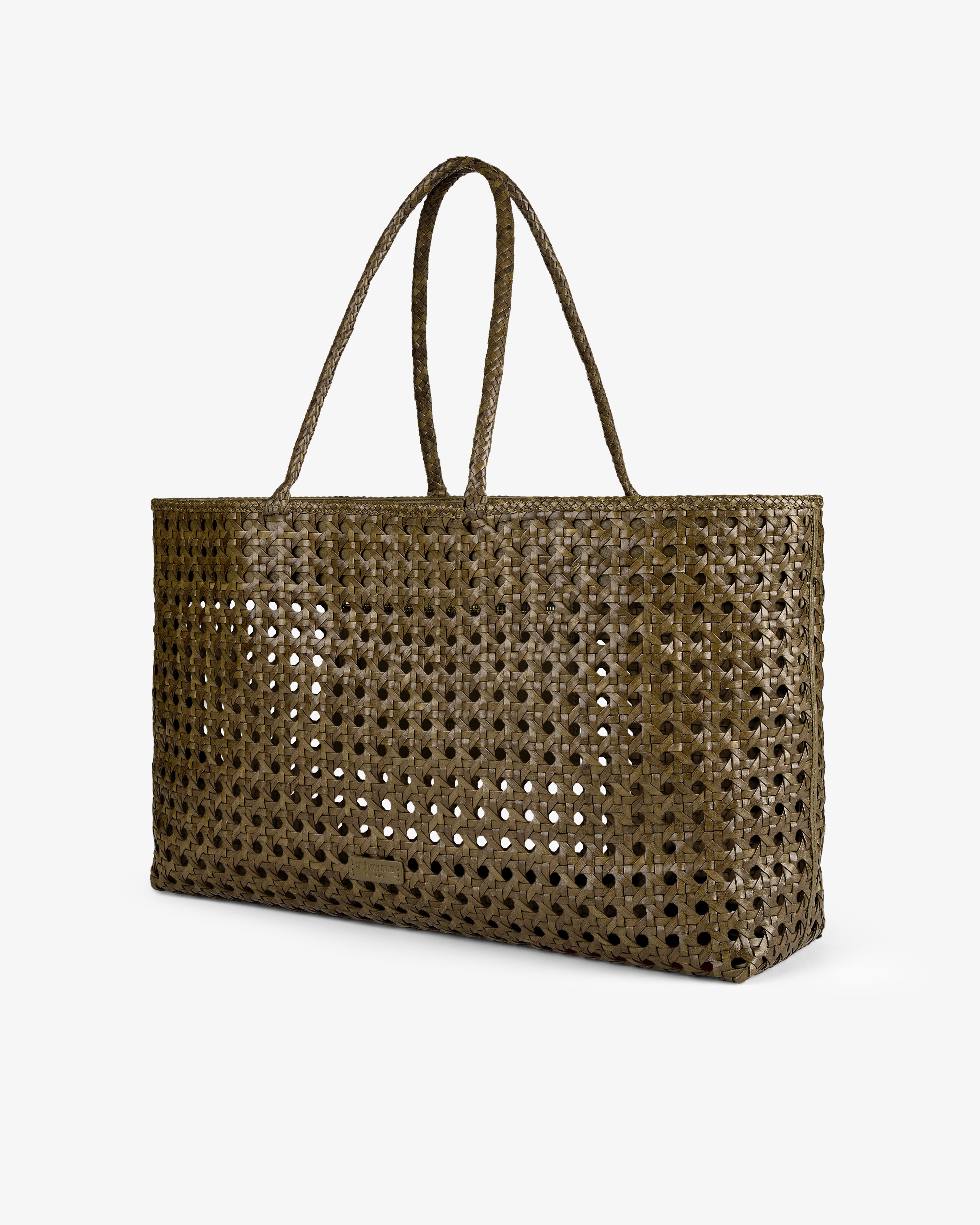 The Woven Leather Tote Bag is large, olive-green, with an open mesh design and two handles, shown on a white background.