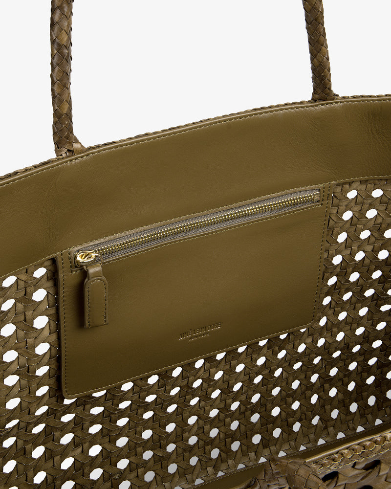 Interior view of the Woven Leather Tote Bag in olive green, featuring a zip pocket and leather trim.