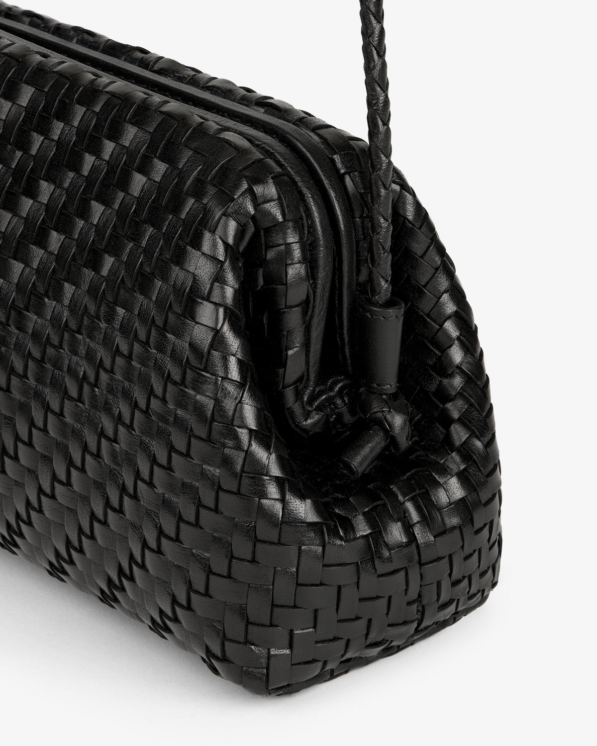 Close-up of the Woven Leather Shoulder Bag in black, featuring a drawstring and detailed woven texture.