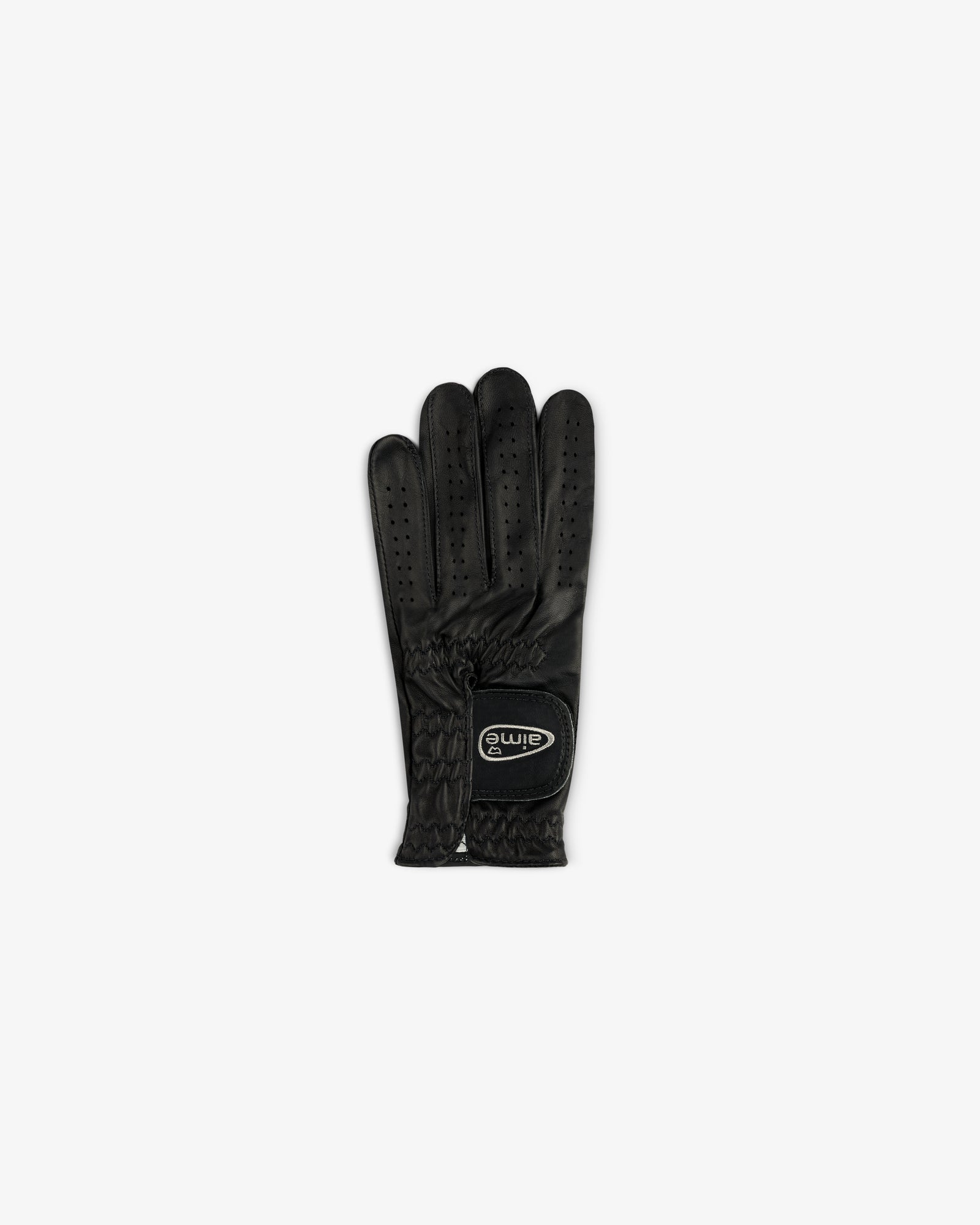 A single black ALD / FootJoy StaSof Heritage Glove (Left) with small perforations and logo, on a white background.