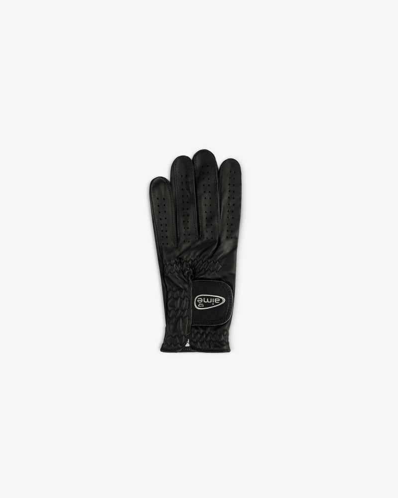 A single black ALD / FootJoy StaSof Heritage Glove (Left) with small perforations and logo, on a white background.