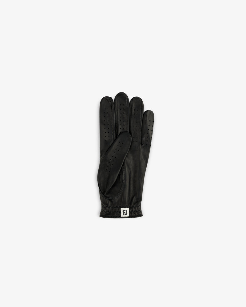 ALD / FootJoy StaSof Heritage Glove (Left): black leather, vented, elastic wrist, FJ logo on cuff, top view.