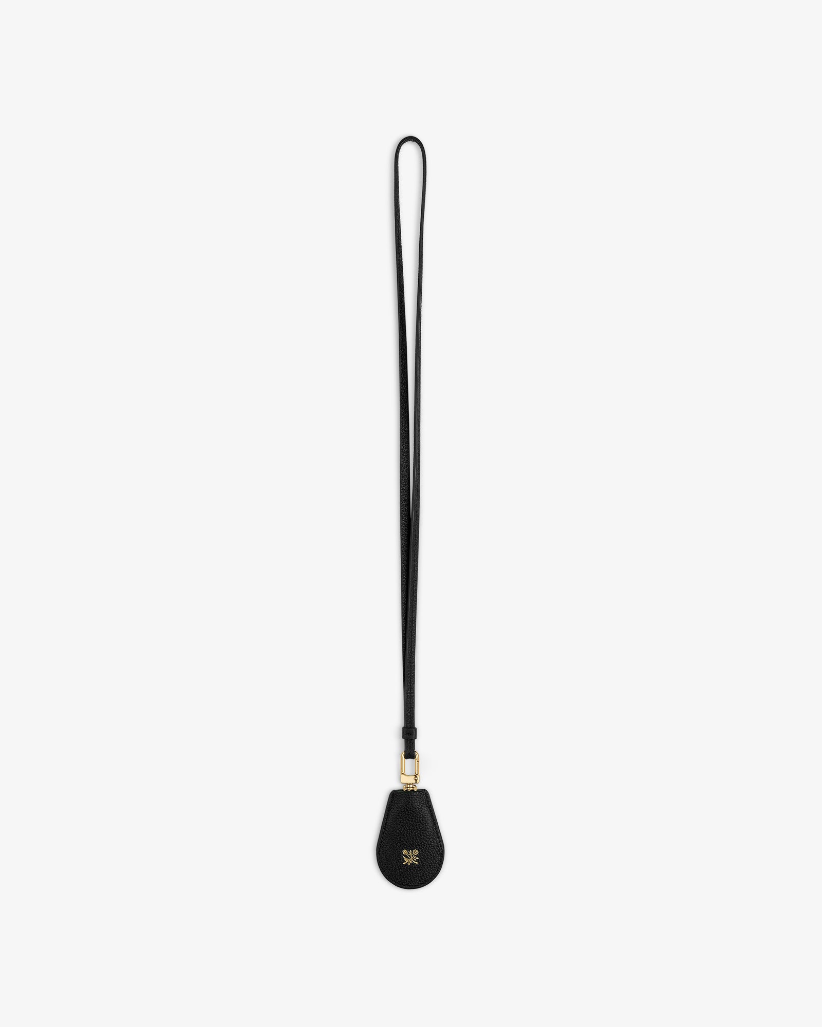Black Leather Key Cover with teardrop pouch and gold clasp, isolated on a white background.