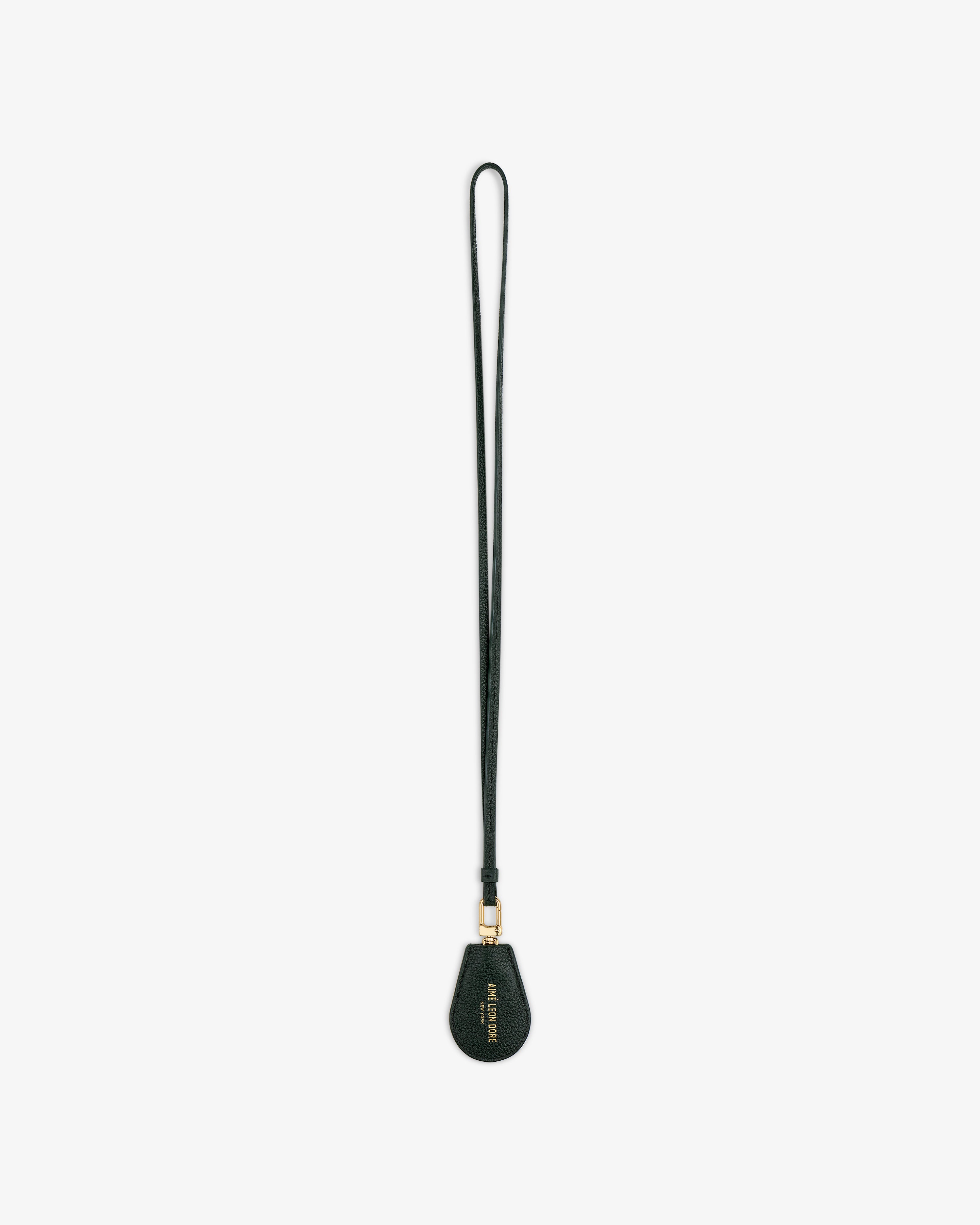 A black Leather Key Cover with a teardrop end and gold hardware, shown on a white background.