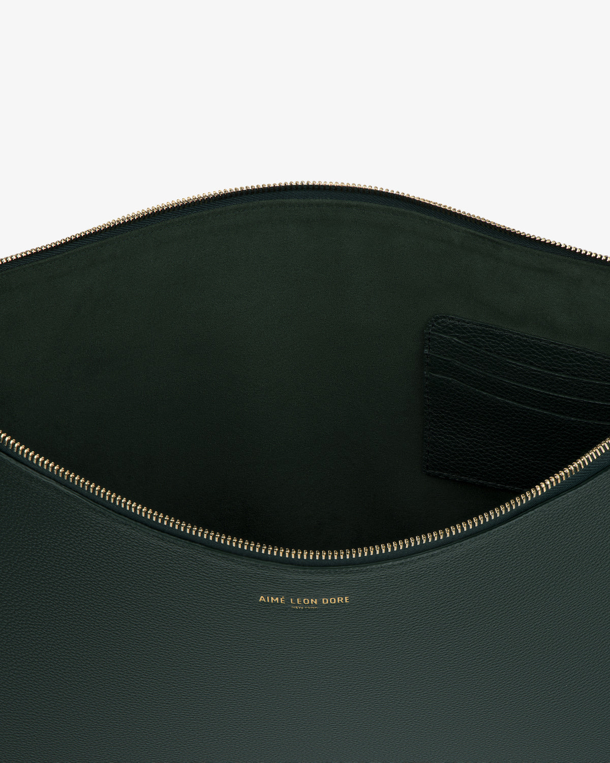 Open Large Leather Pouch in dark green leather with gold zipper, interior card slots, and AIME LEON DORE logo.
