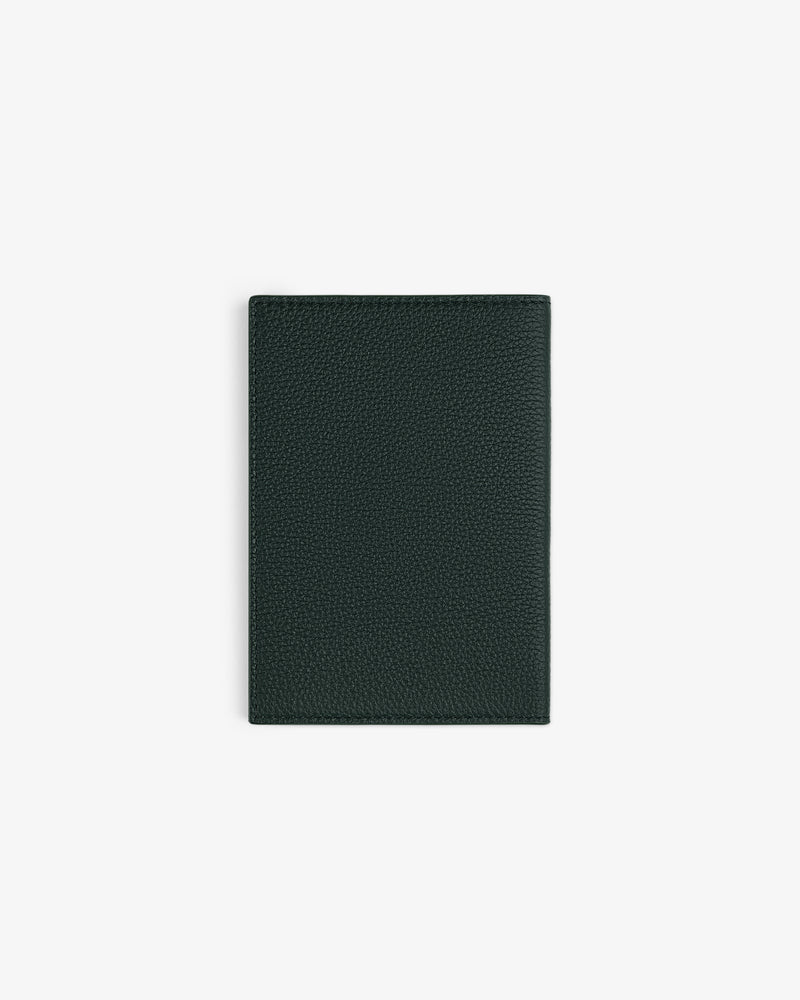 A closed Leather Passport Holder in dark green textured leather is centered on a white background.