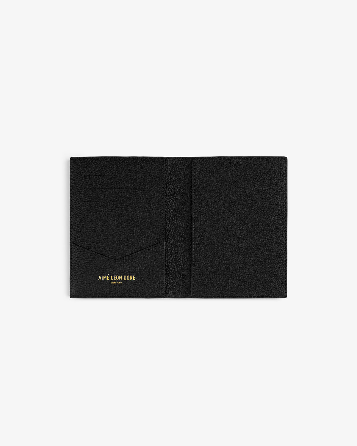 Black leather passport holder with multiple card slots and Aimé Leon Dore gold lettering inside left pocket.