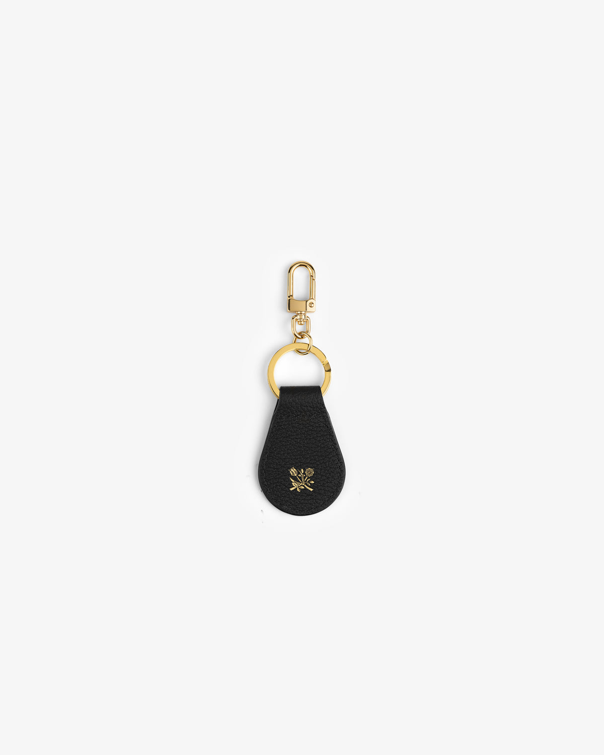 Leather Key Fob in black with gold hardware and emblem, shown on a white background.