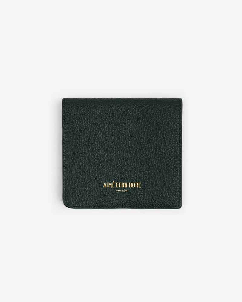 Dark green textured Leather Bi-Fold Wallet with gold AIME LEON DORE NEW YORK embossed on the front.
