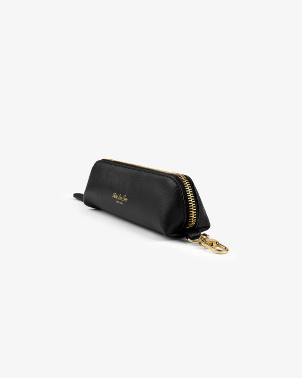 Leather Pencil Case with gold zipper and clip, small gold side text, shown on a white background.