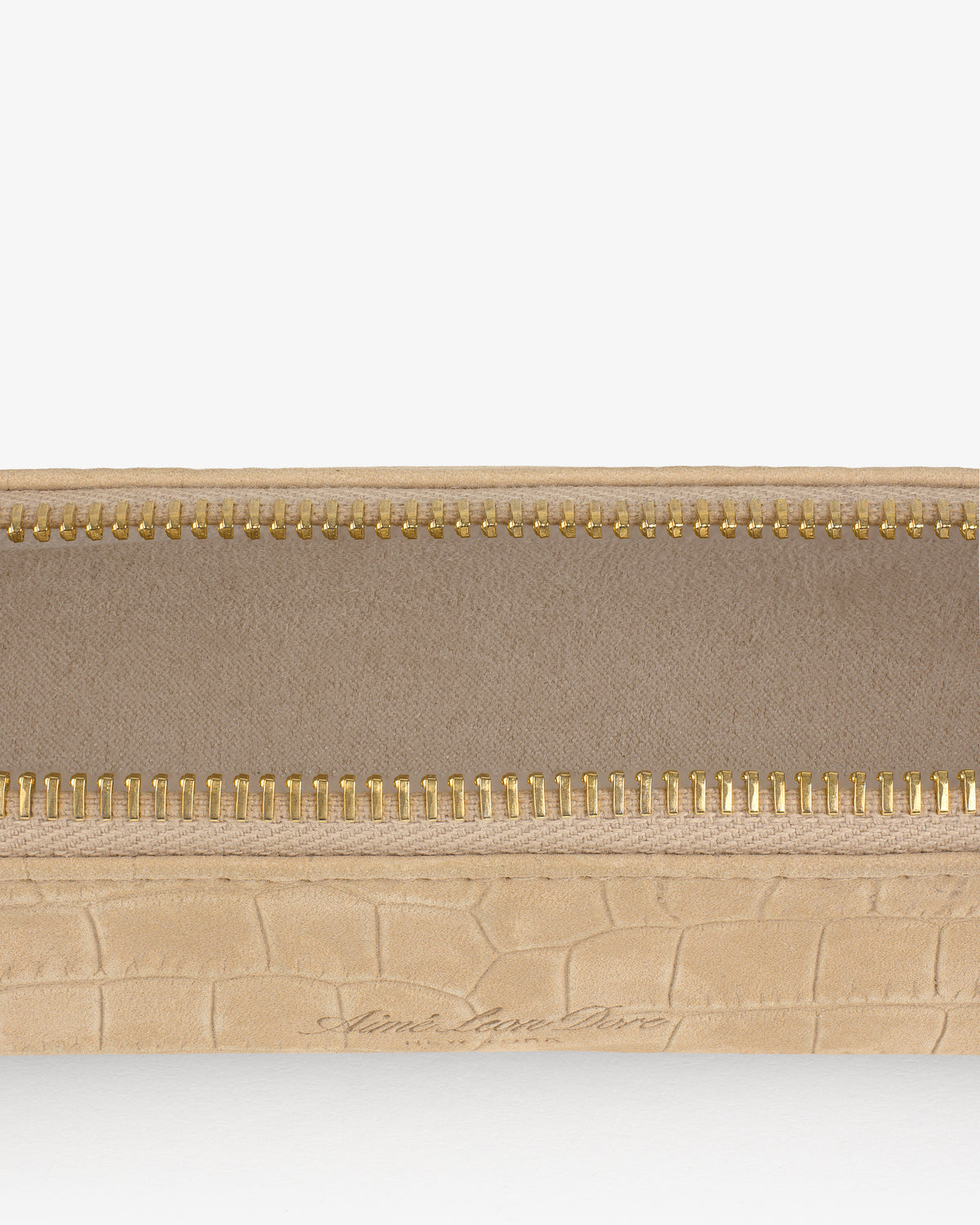Close-up of the Croc-Embossed Nubuck Pencil Case with a gold zipper and visible fabric lining.