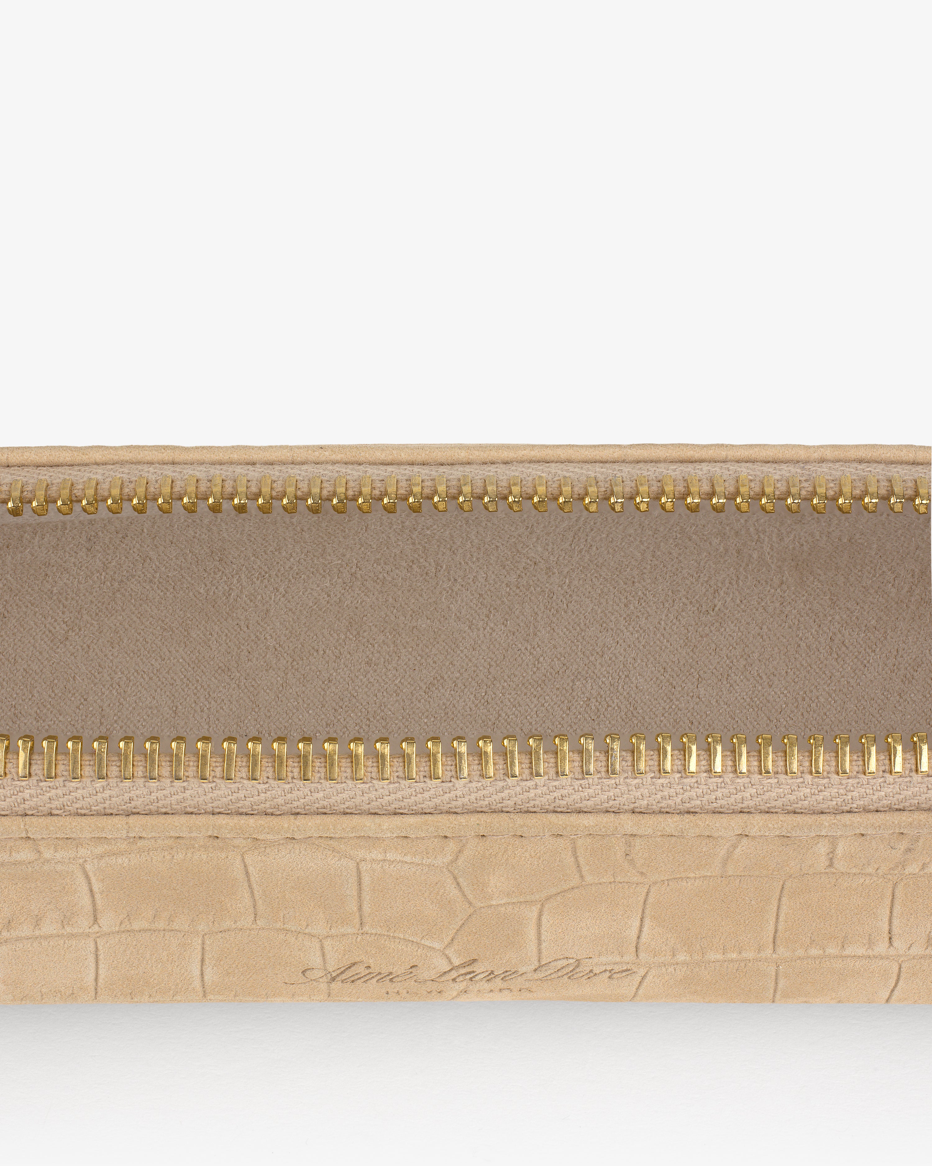 Close-up of the Croc-Embossed Nubuck Pencil Case with a gold zipper and visible fabric lining.