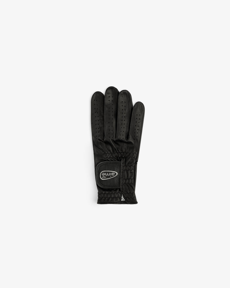 The ALD / FootJoy StaSof Heritage Glove (Right) is black leather with perforations, elastic wrist, and logo patch.
