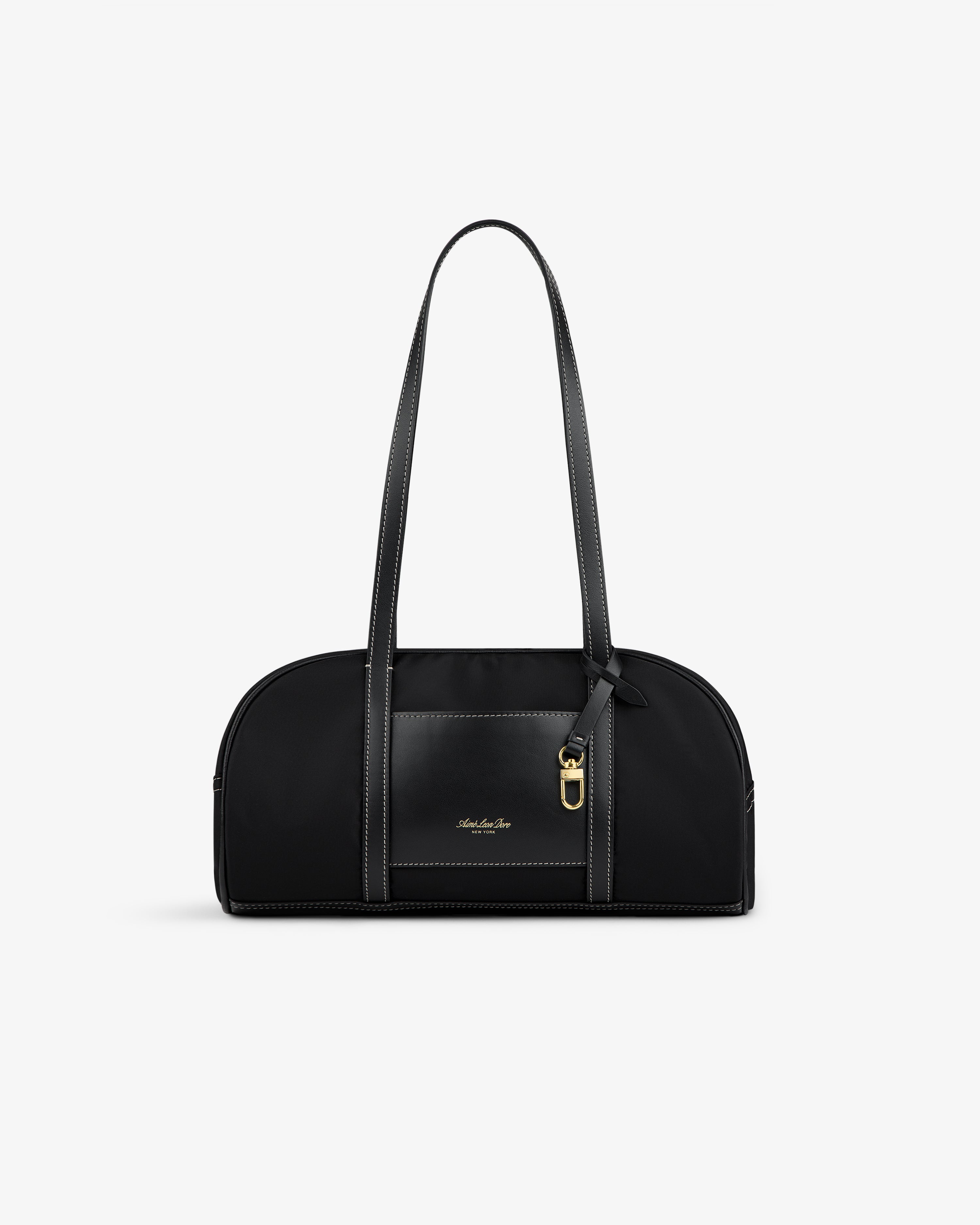 Mini Duffle Shoulder Bag: black with long straps, gold buckle detail, small front logo on a white background.