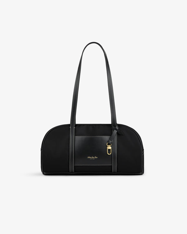 Mini Duffle Shoulder Bag: black with long straps, gold buckle detail, small front logo on a white background.