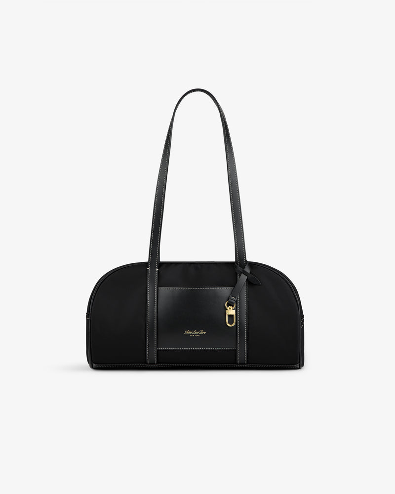 Mini Duffle Shoulder Bag: black with long straps, gold buckle detail, small front logo on a white background.