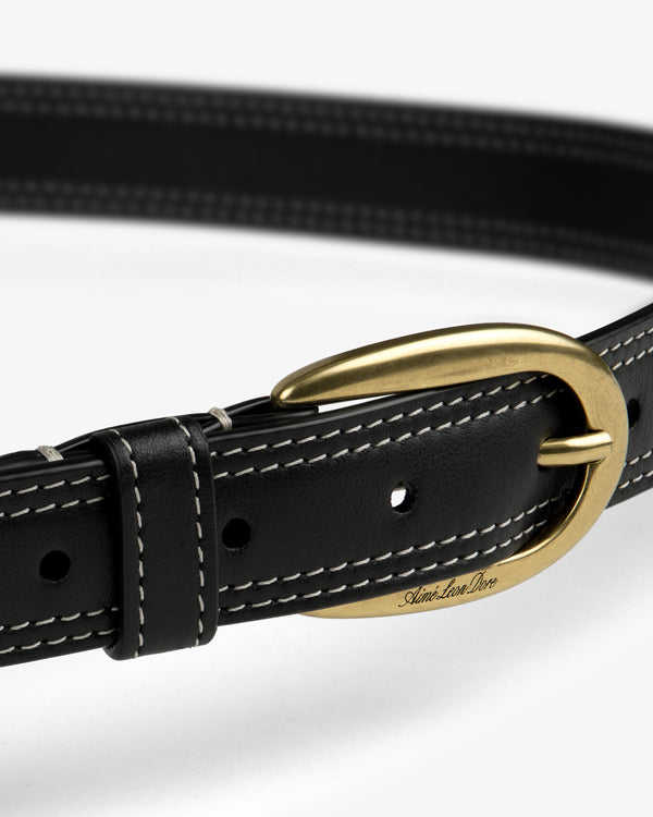 Convertible Leather Belt Bag in black leather with white stitching and a gold oval buckle on a white background.