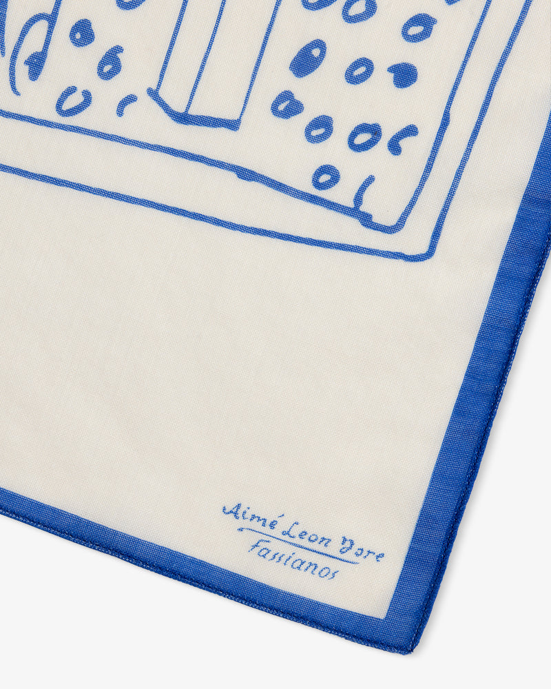 White Fassianos Wool Silk Bandana with blue abstract design, blue border, and Aimé Leon Dore Fasianos in the corner.