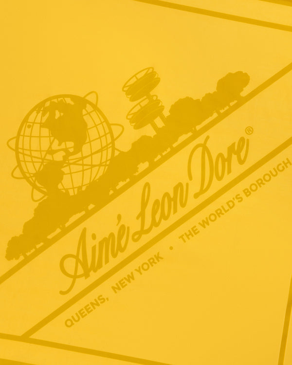 Yellow graphic with globe, trees, structures on the Sun Faded Unisphere Bandana by Aimé Leon Dore, Queens, NY.