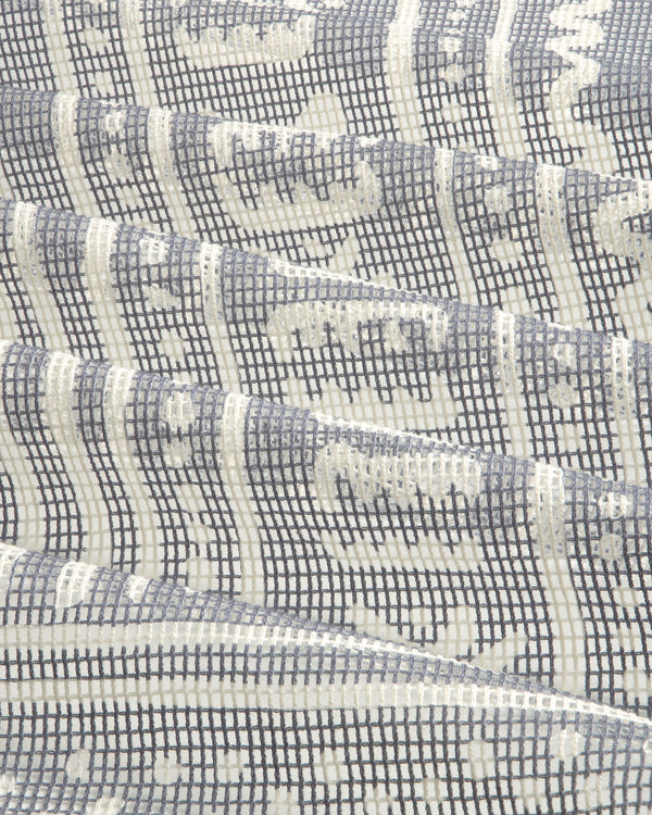 Close-up of the Mesh Tapestry Bandana, showing a geometric grid and abstract pattern in white and gray.
