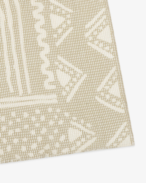 Mesh Tapestry Bandana in beige and white with geometric triangles and dots, displayed at an angle.
