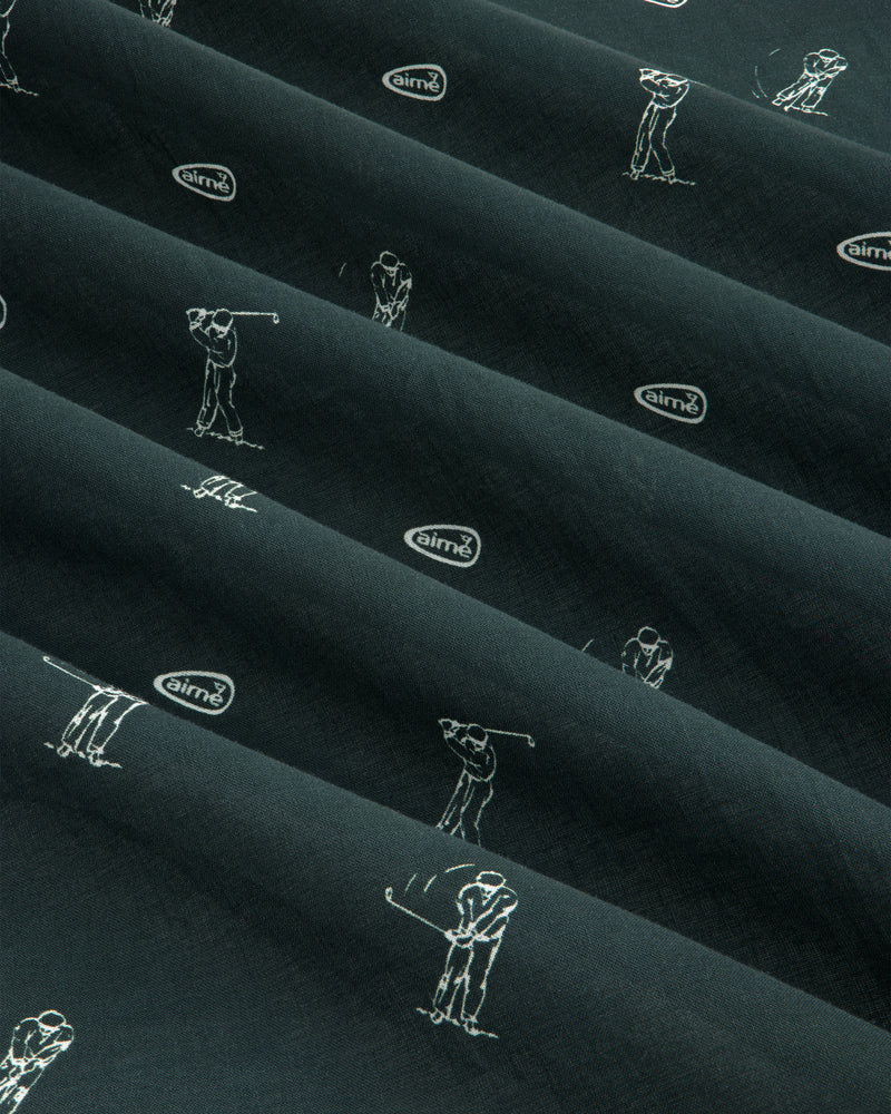 The ALD Golf Swing Bandana features dark fabric with white golfer line art and small airmx logos in diagonal rows.