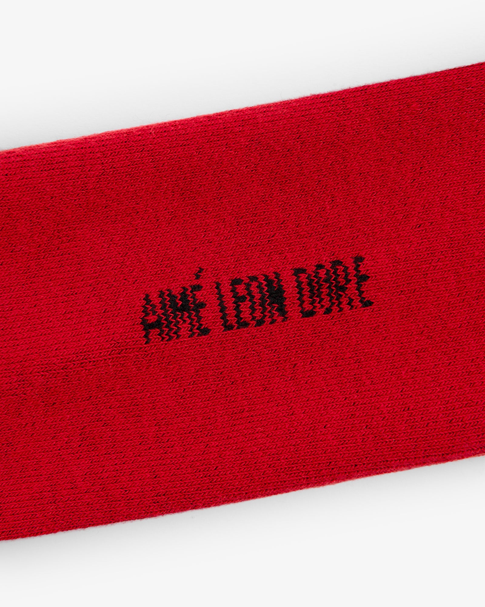 Red Crew Sock 3-Pack featuring "AIMÉ LEON DORE" stitched in black capital letters at the center.