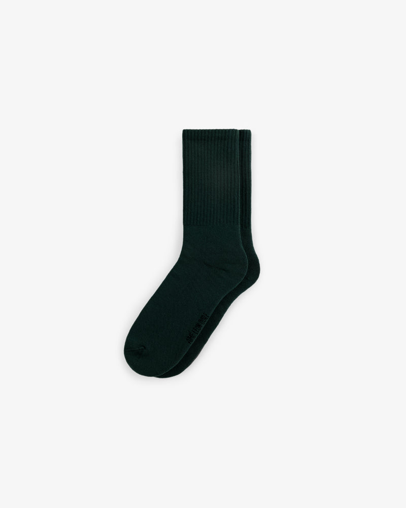 A single dark green sock from the Crew Sock 3-Pack, featuring a ribbed upper, shown on a white background.