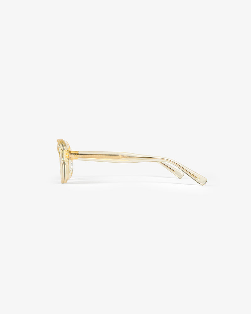 Side view of Onásis Sunglasses with clear yellow rectangular frames and slightly curved arms on a white background.