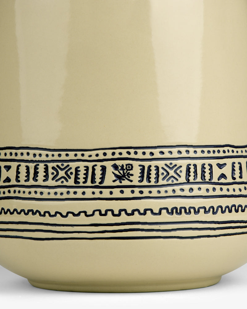 Textile Patterned Treat Jar in beige ceramic with a navy floral geometric band around its base.