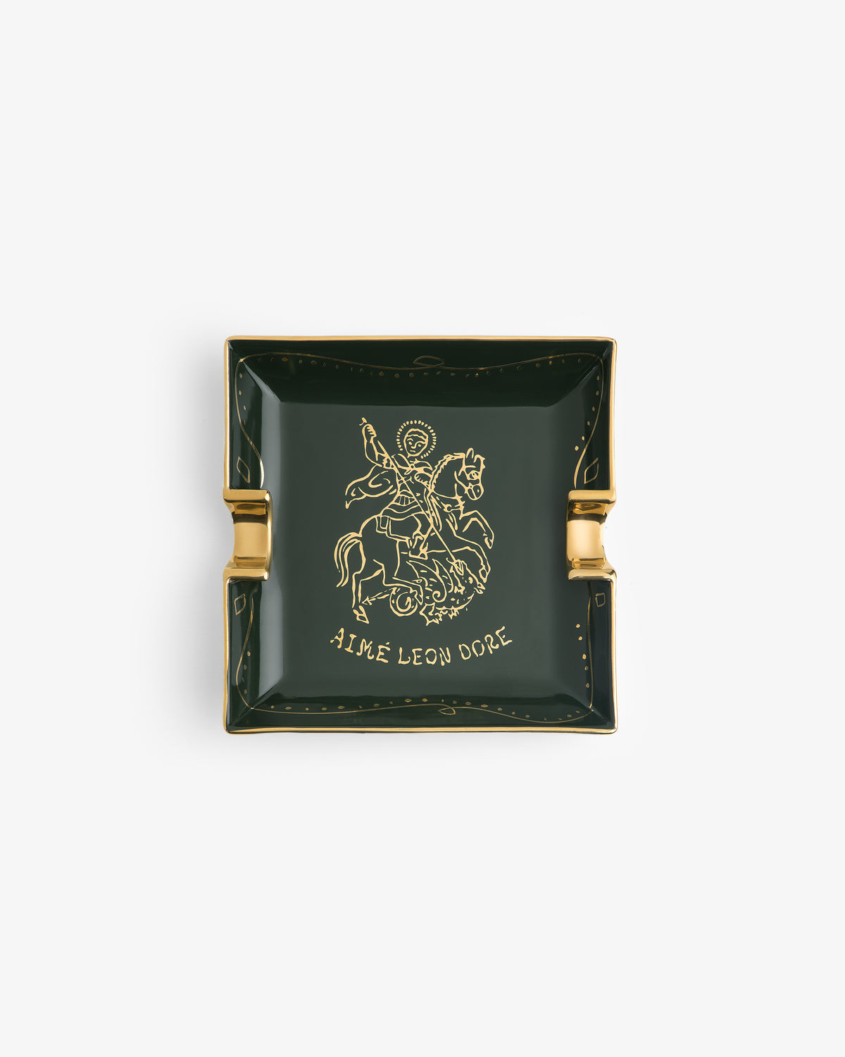Dark green Saint George Ashtray with gold edges, horse rider drawing, and Aime Leon Dore label.