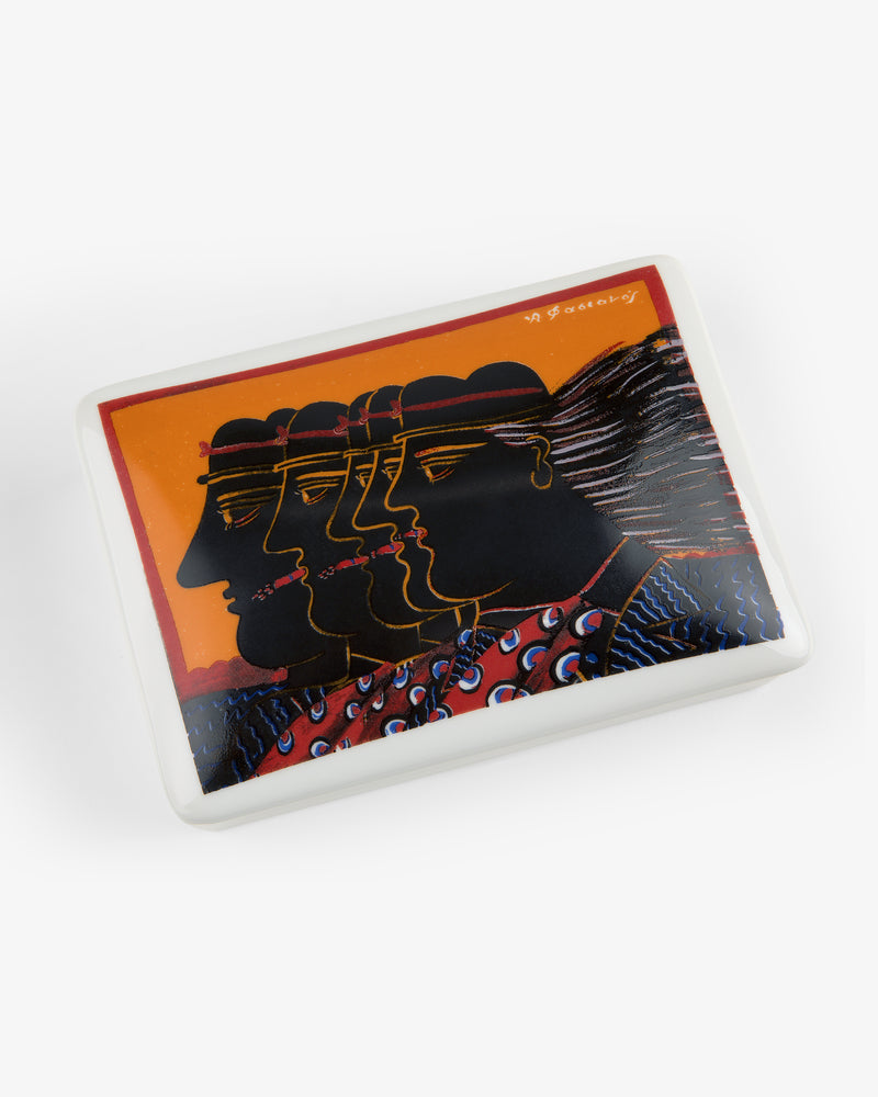 Fassianos "Friendship" Card Box: rectangular ceramic with four abstract faces on an orange patterned background.