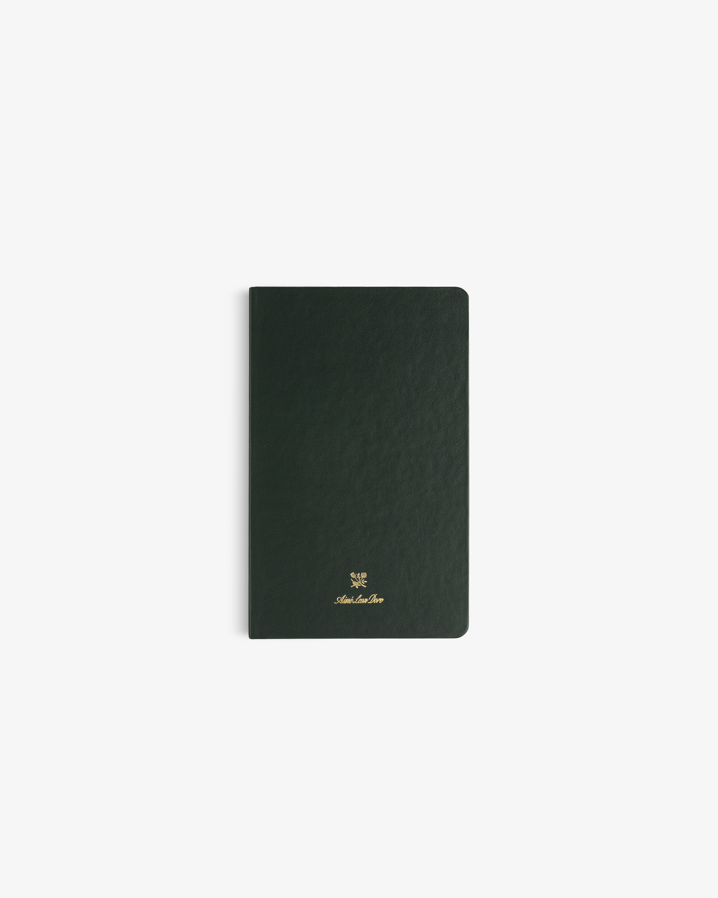 The Crest Sketchbook is a slim, dark green notebook with gold text and logo on the cover, shown on a white background.