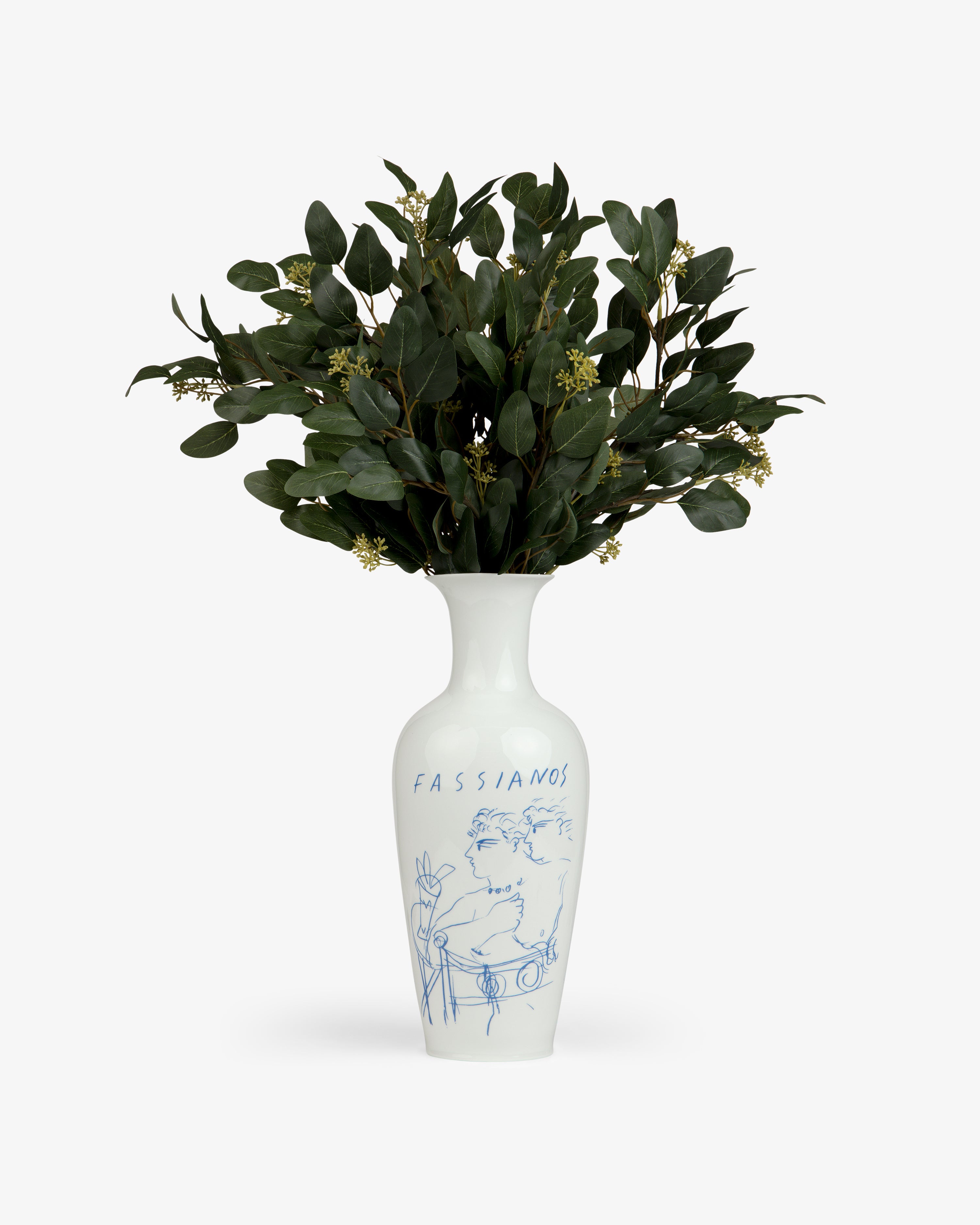 Fassianos "Rendez - Vouz" Vase with blue line art, holding leafy green branches and small white buds.