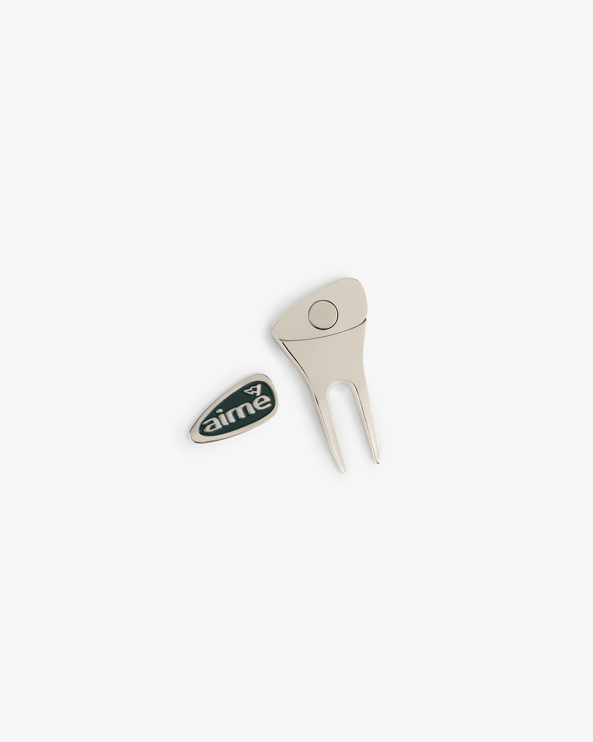 ALD Golf Divot Tool and oval enamel pin with "aime" text on a white background.