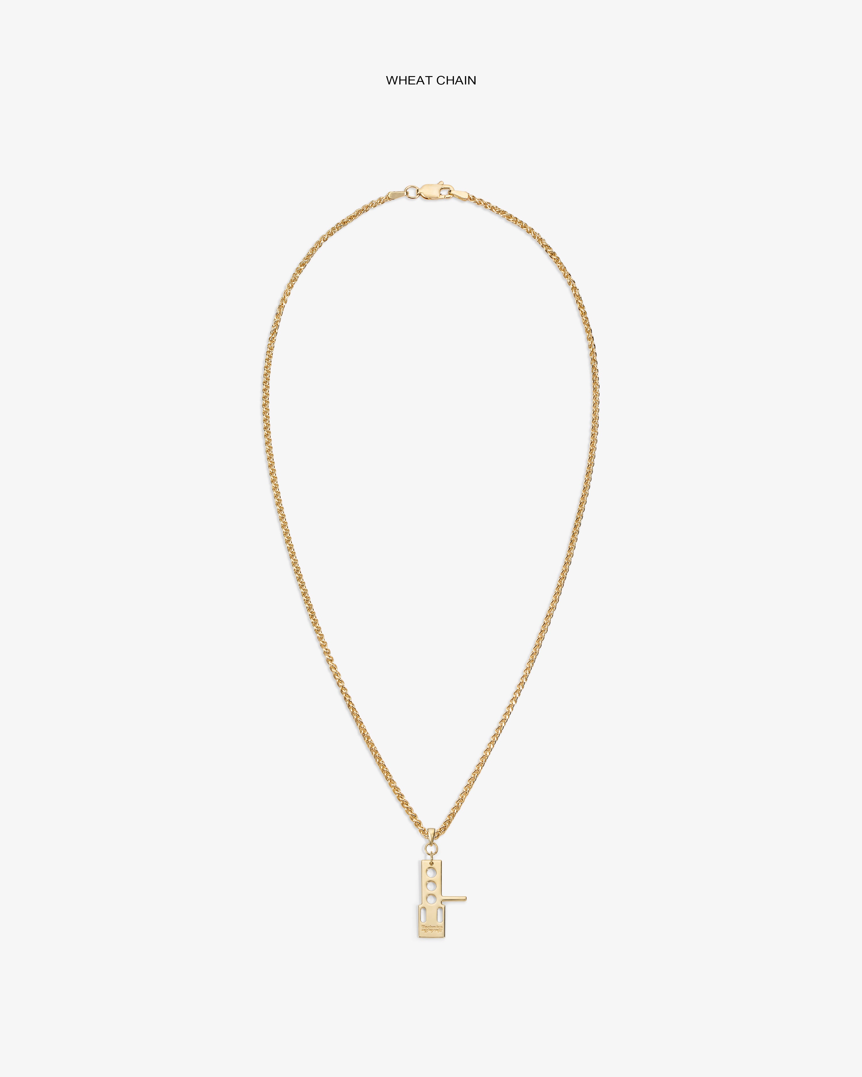 ALD / Technics 14Kt Gold Pendant on a wheat chain, key-shaped, shown against a plain white background.