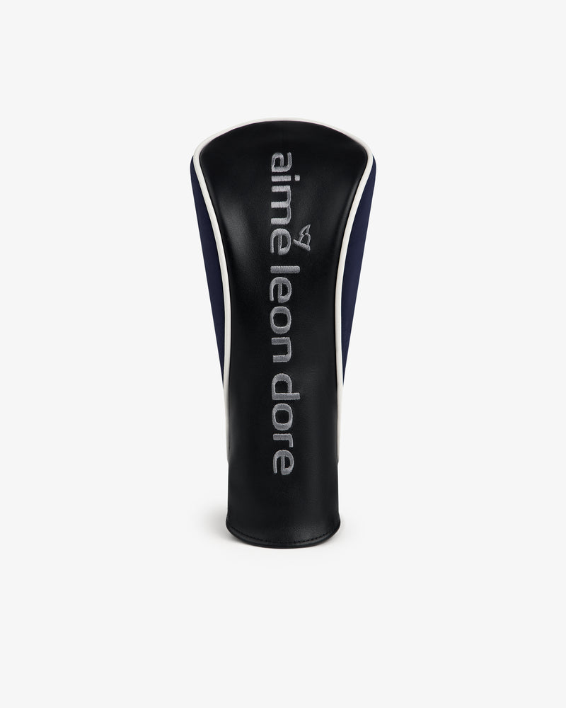 ALD Golf Driver Cover in black leather with a small white aime leon dore logo embroidered on the front.