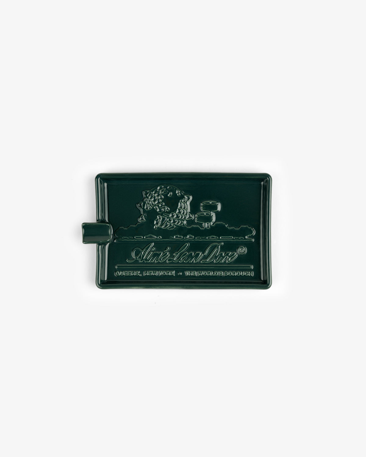 Dark green Ceramic Unisphere Ashtray, rectangular shape with embossed lion and text, plus a small side handle.